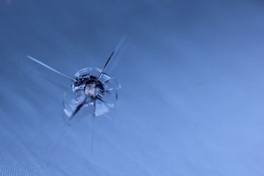 A close in picture of cracked glass.