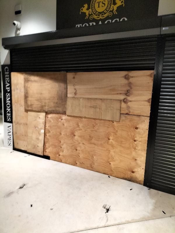Shop Front With Wooden Cover — ASAP Glass Pty Ltd