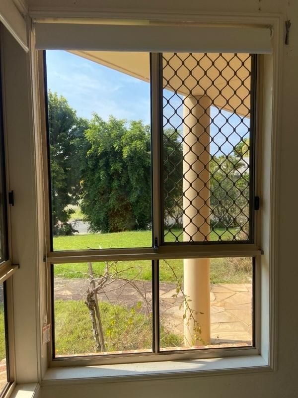 Window With a Fence and Grass Outside
