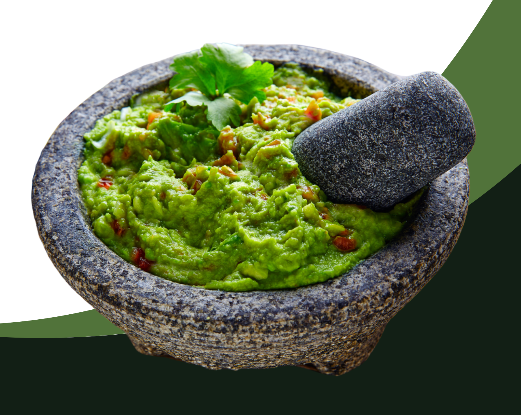 Un tazón de guacamole con un mortero dentro.