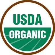 El logotipo orgánico del USDA es un círculo verde y blanco con un borde marrón.