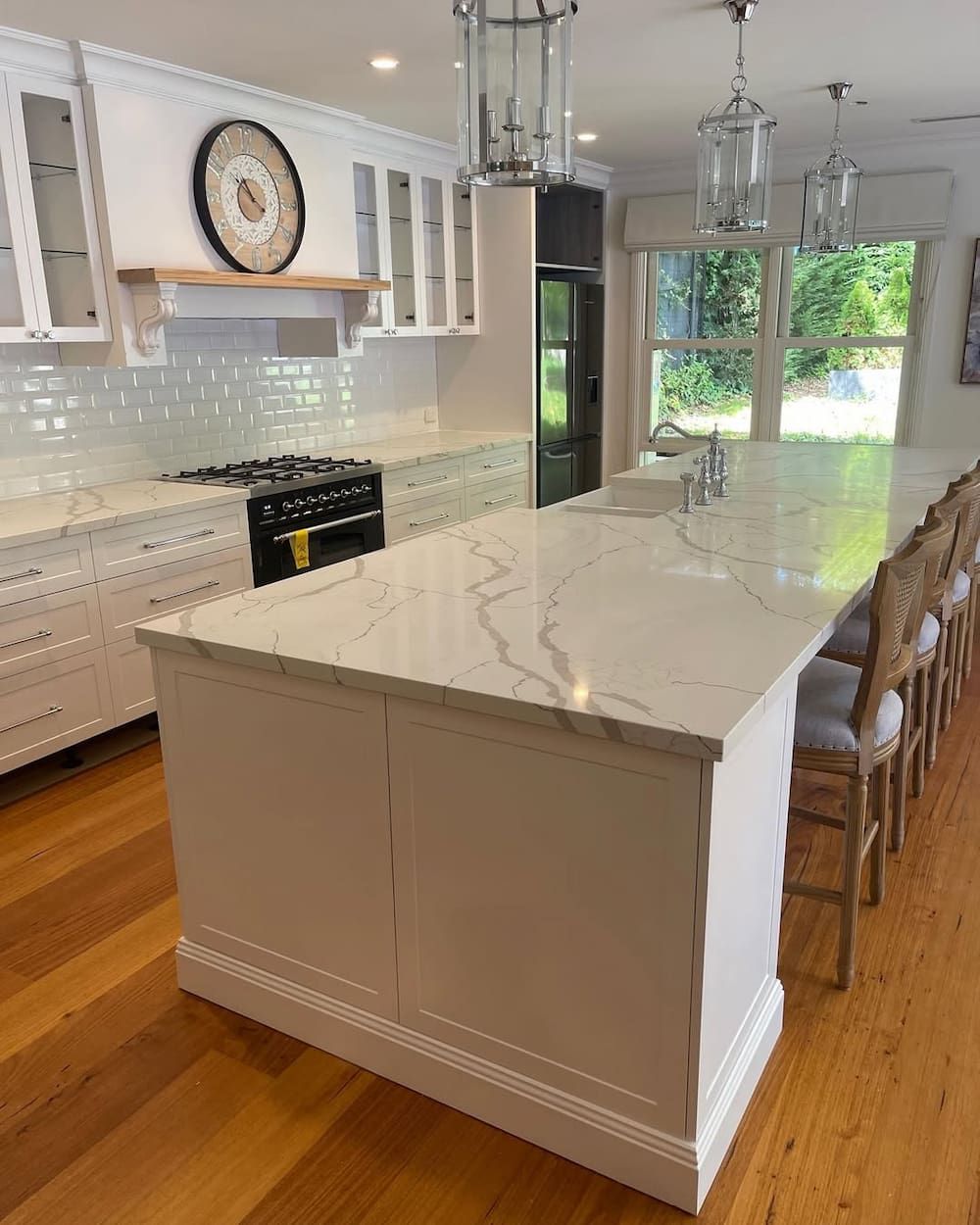 There is a Large Island in the Middle of the Kitchen — Canberra Bathroom Solutions in Tuggeranong, ACT