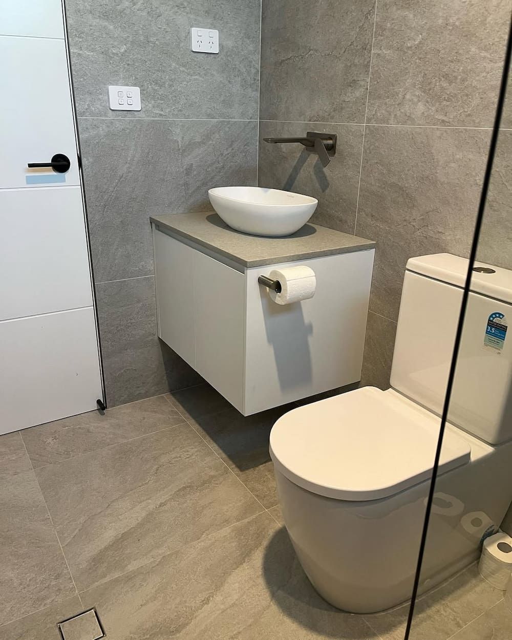 A Bathroom With a Toilet Sink and Shower — Canberra Bathroom Solutions in Ngunnawal, ACT