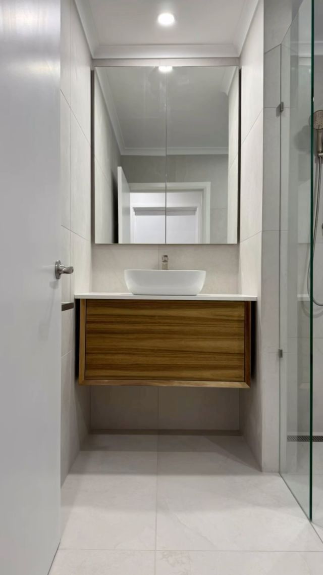 A Bathroom With a Sink , Mirror and Walk in Shower — Canberra Bathroom Solutions in Ngunnawal, ACT