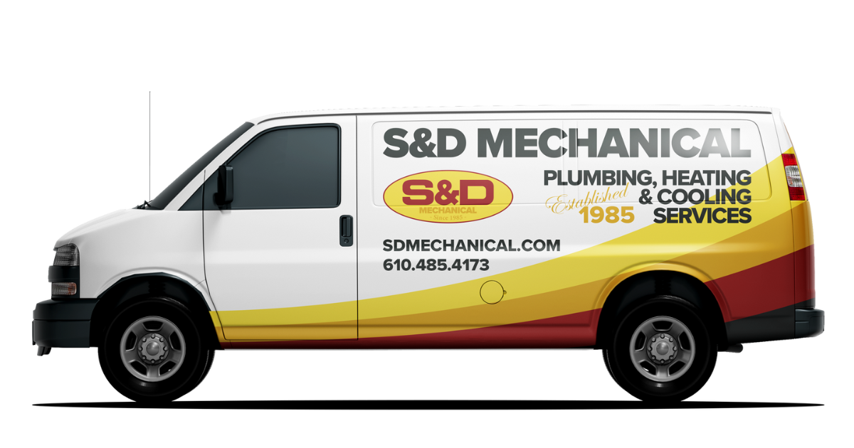 White S&D Mechanical van with logo, providing plumbing, heating, and cooling services.
