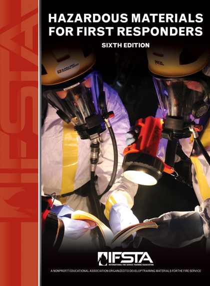 Cover of a textbook on hazardous materials for first responders, showing responders in protective gear attending to a casualty.