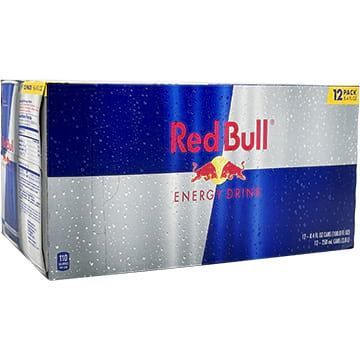 A 12-pack of Red Bull energy drink cans, in a blue, silver, and red cardboard box.