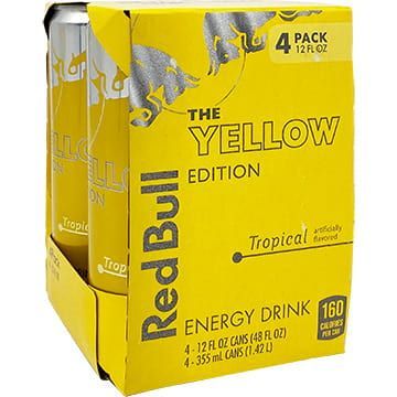Yellow Red Bull energy drink can with tropical flavor.
