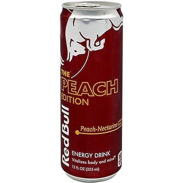 Red Bull Peach Edition energy drink can, burgundy with white logo, text, and peach-nectarine flavor.