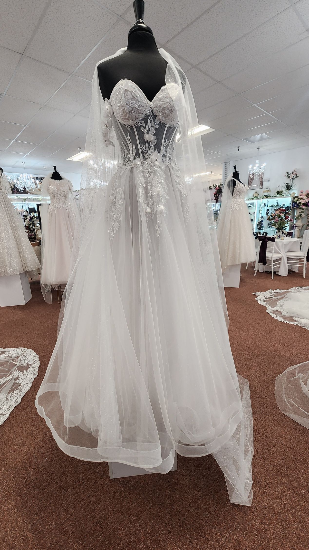 French white off-the-shoulder floral A-line bridal gown