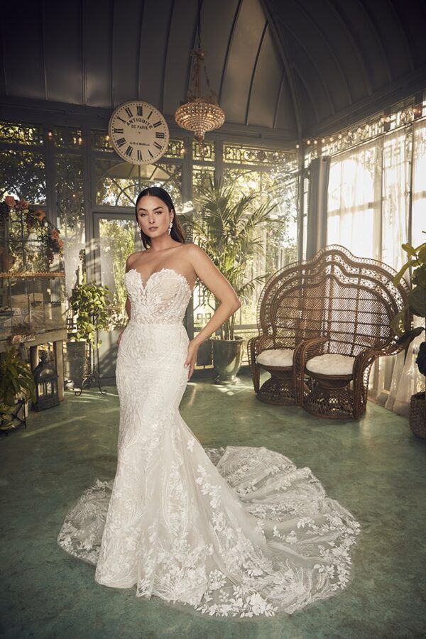 Sparkling sequin beaded lace fit & flare bridal gown at Beyond Le Veils Bridal in Vancouver, WA, showcasing intricate bead work and elegant lace details for a stunning bridal look.