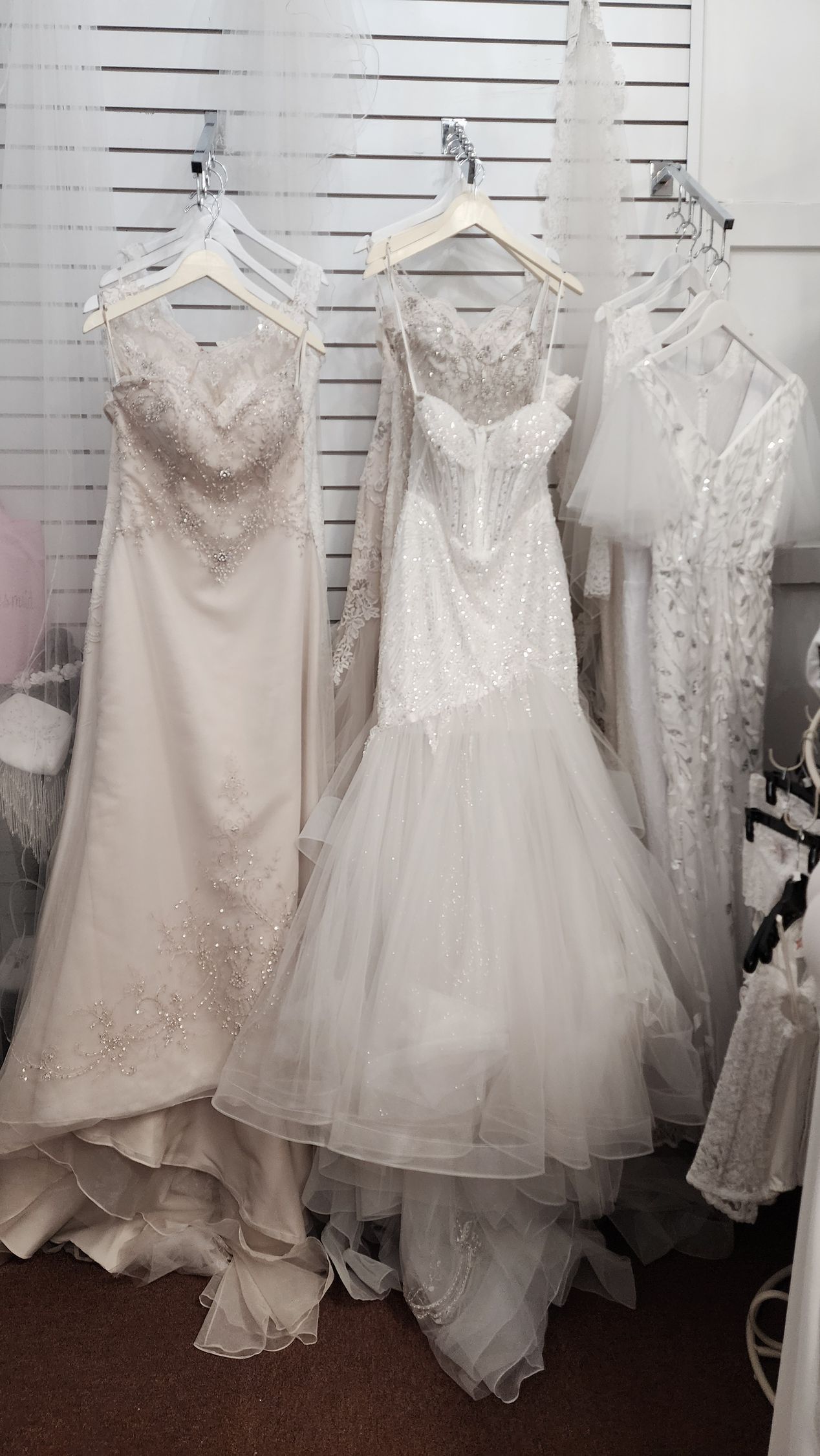 Assorted designer bridal gowns up to 85% off