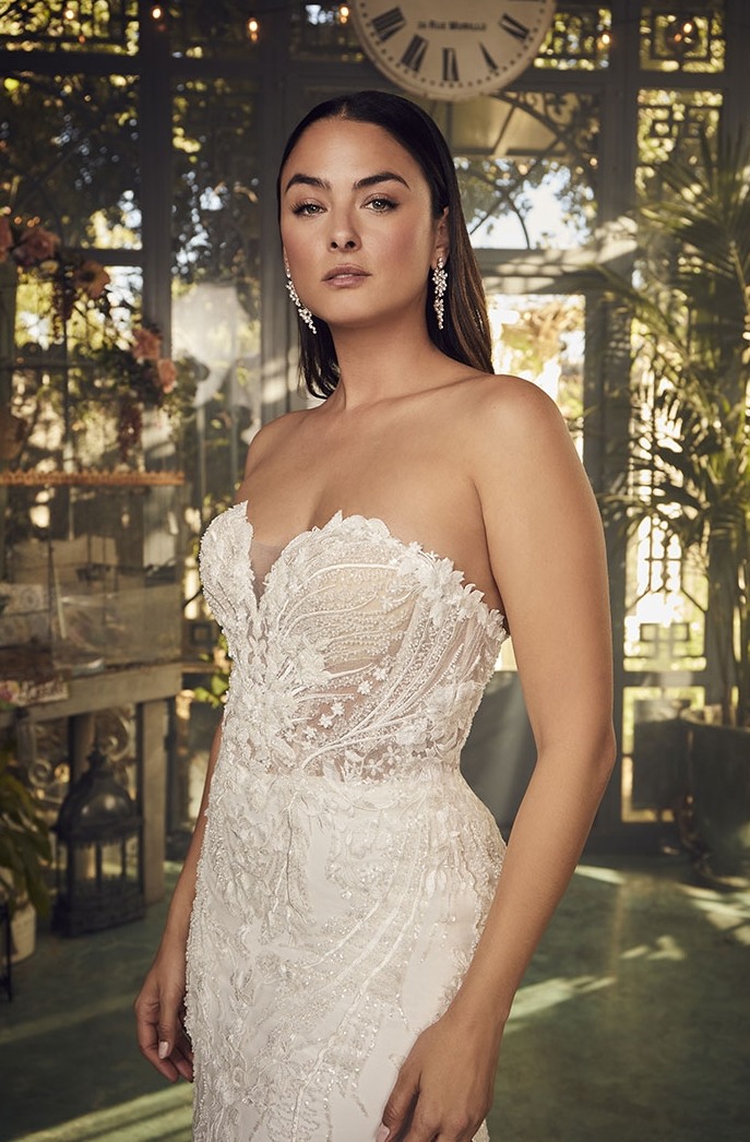 Sparkling sequin beaded lace fit & flare bridal gown at Beyond Le Veils Bridal in Vancouver, WA, showcasing intricate bead work and elegant lace details for a stunning bridal look.