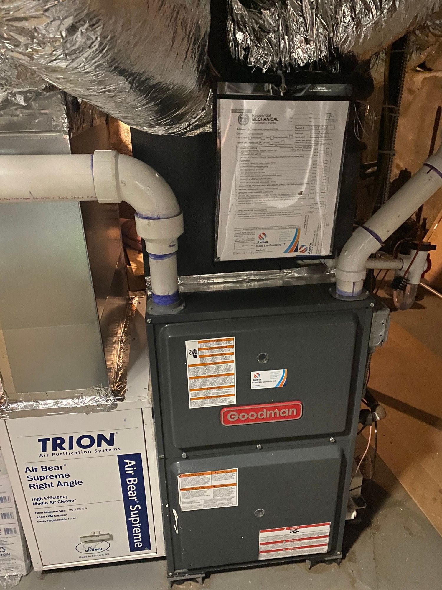 a heating and cooling system is installed in a basement .
