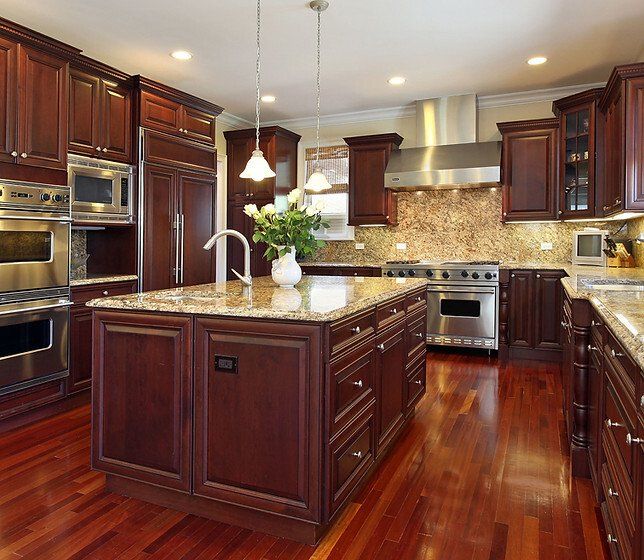 Kitchen with brown cabinets — Wauwatosa, WI — Savers Kitchen & Bath