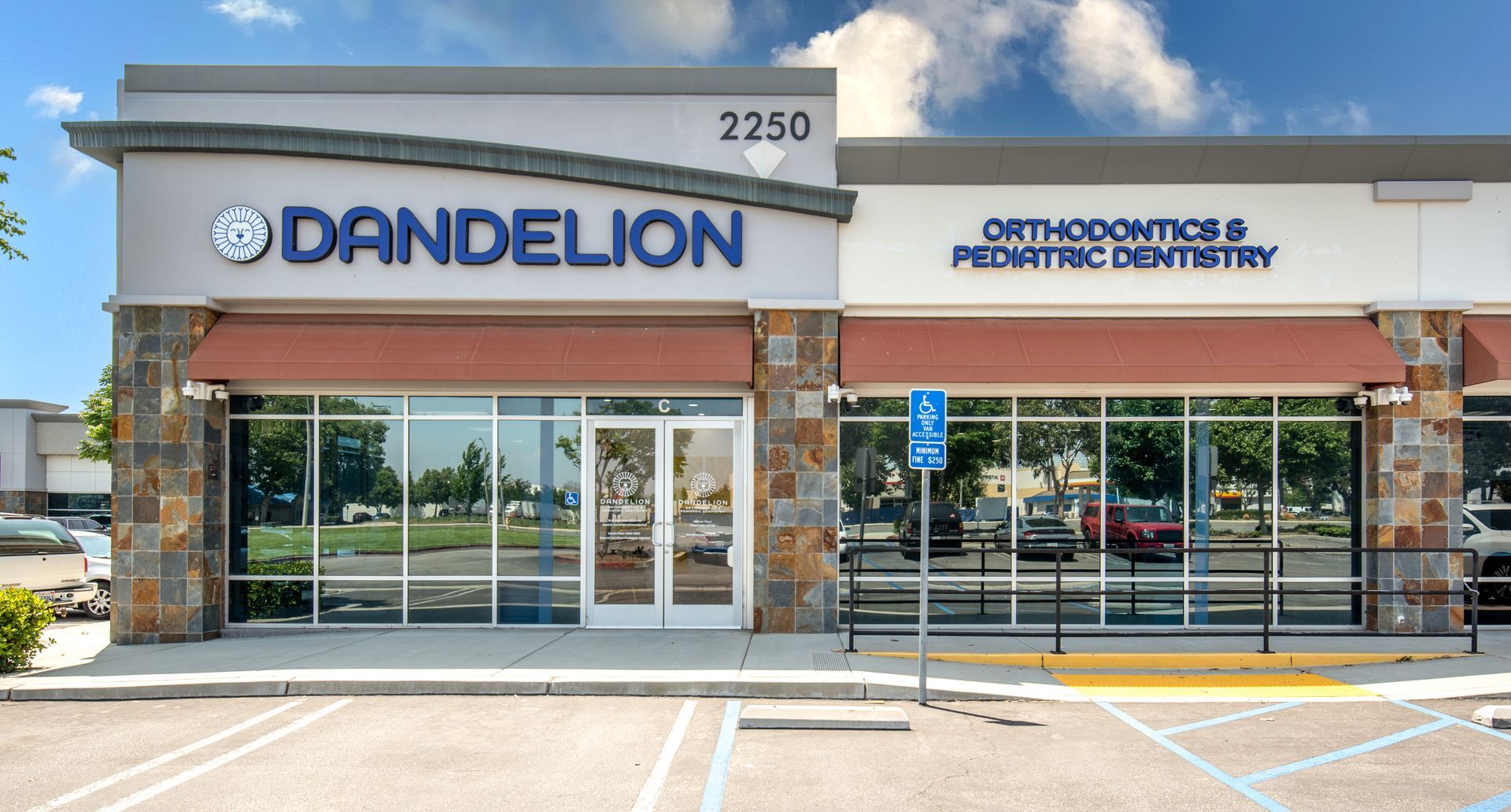 Dandelion Orthodontics and Pediatric Dentistry storefront in a strip mall.