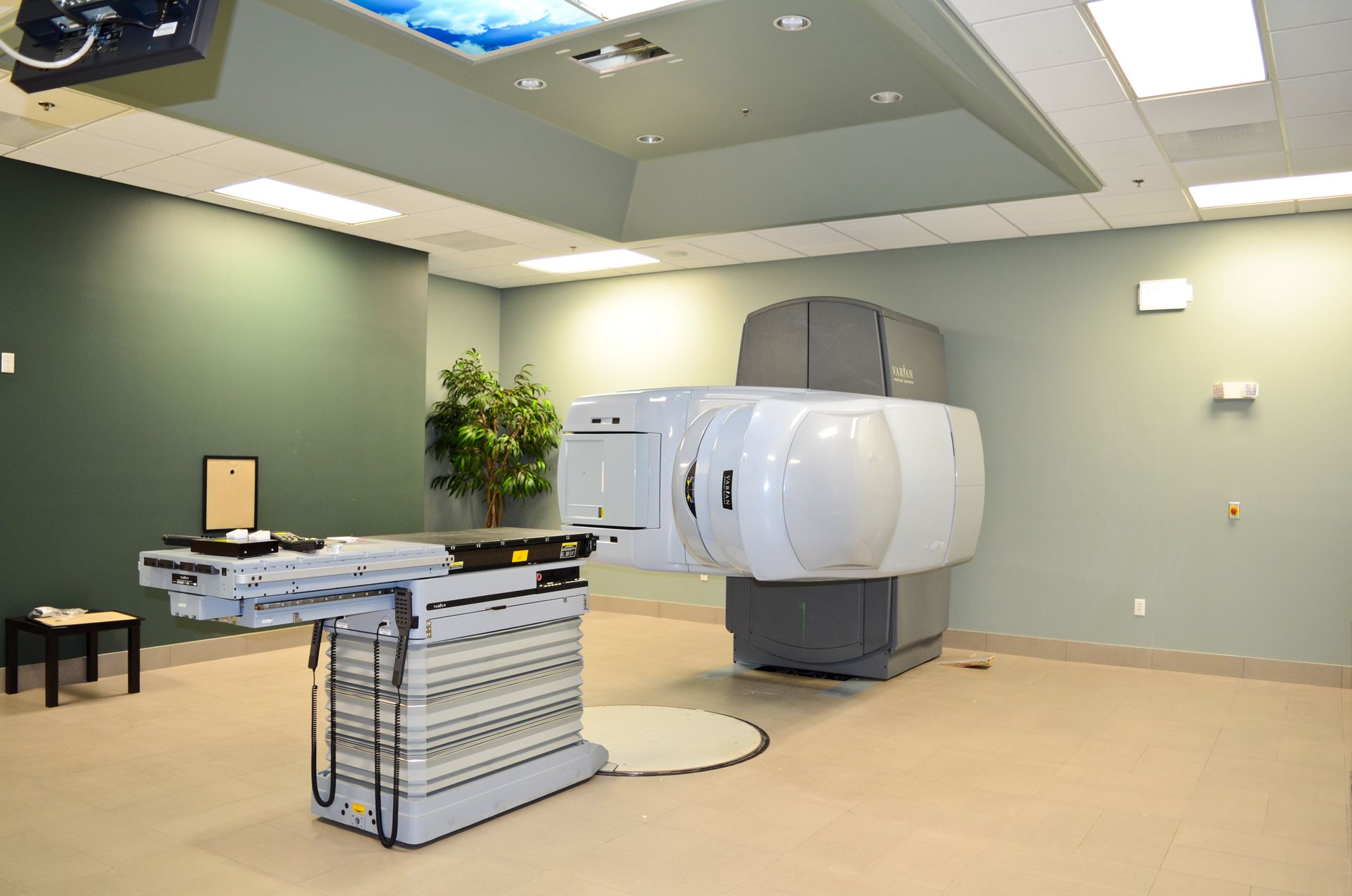 Radiation therapy machine in a treatment room.