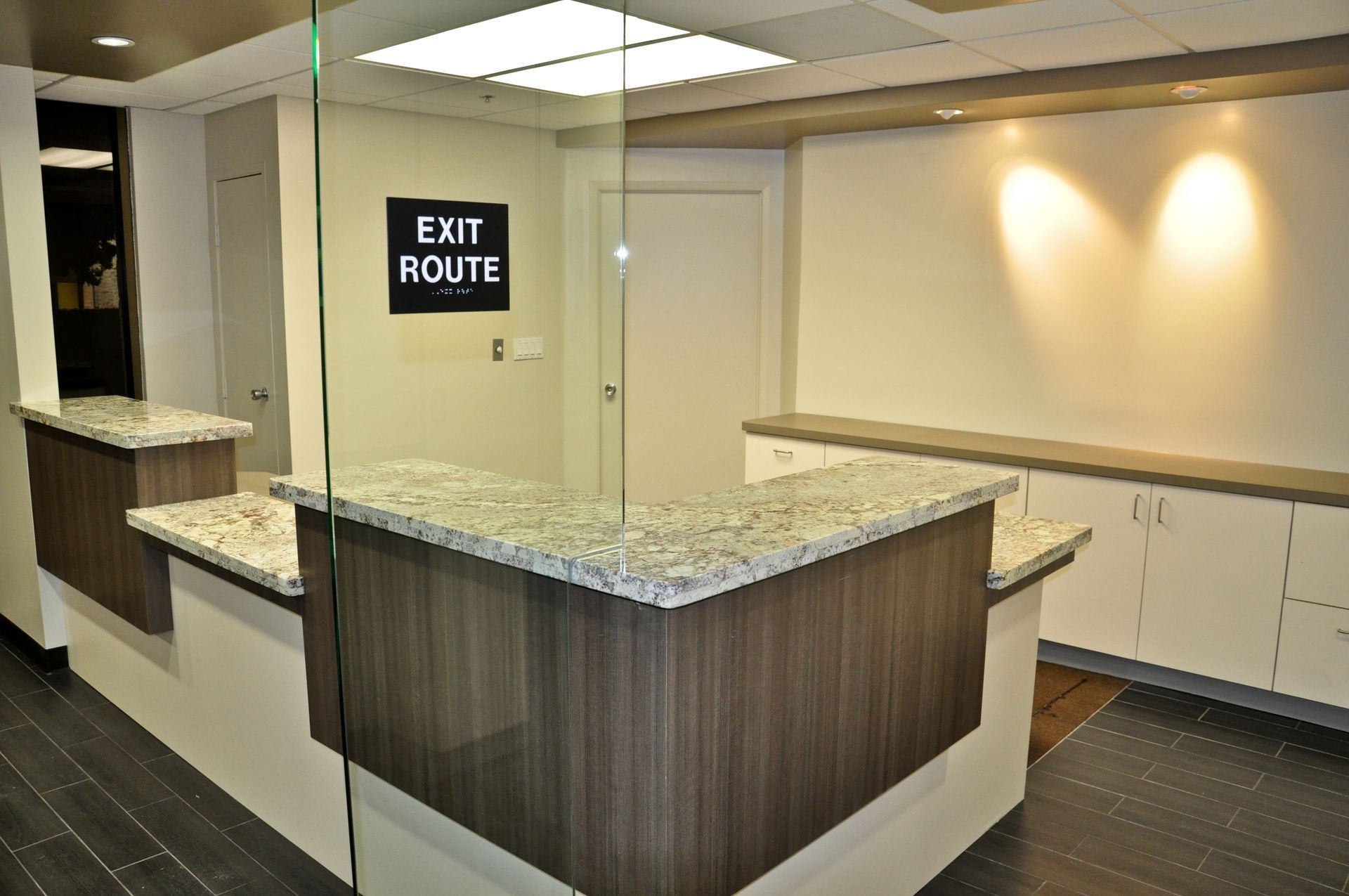 Reception desk with granite countertop and 