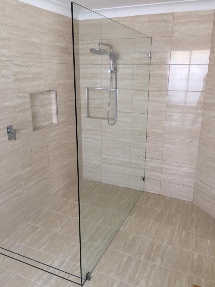 A Bathroom with A Walk in Shower and A Shower Head ā Gads Glass & Shower Screens in Albion Park, NSW