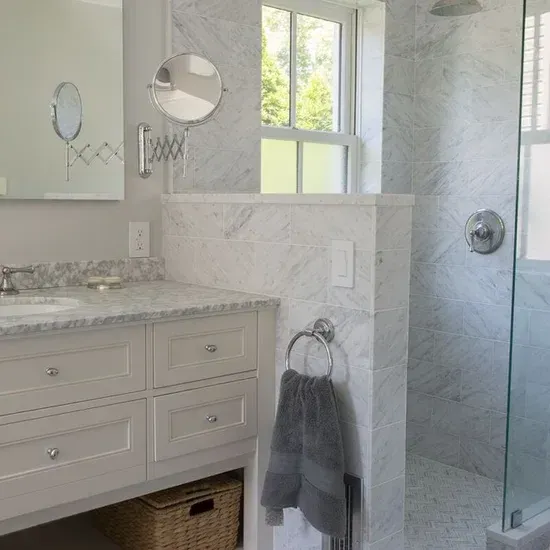 A bathroom with a sink , mirror , and shower. James McCoy Remodeling Services Serving 19072,19003,19118,19444,19095 and surrounding areas