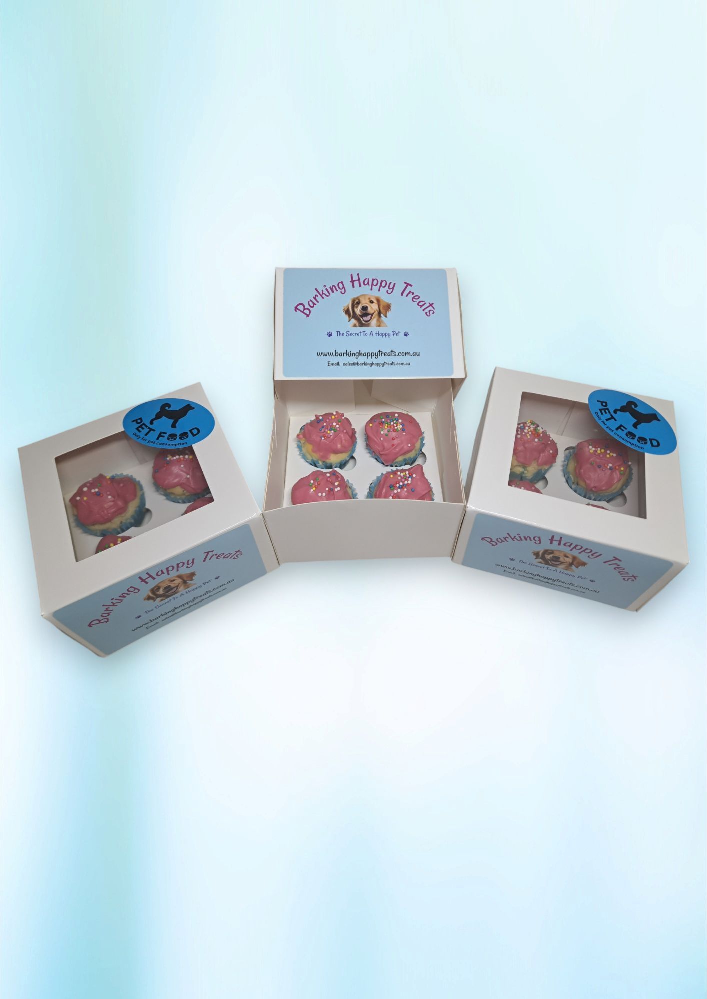 Three Boxes Of Cupcakes Are Sitting On Top Of Each Other On A Table — Barking Happy Treats In Collombatti, NSW