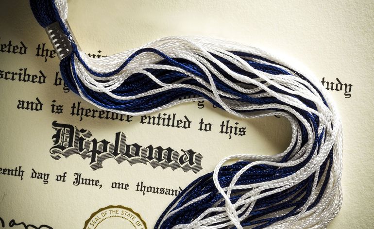 Diploma with a blue and white tassel, a formal document.