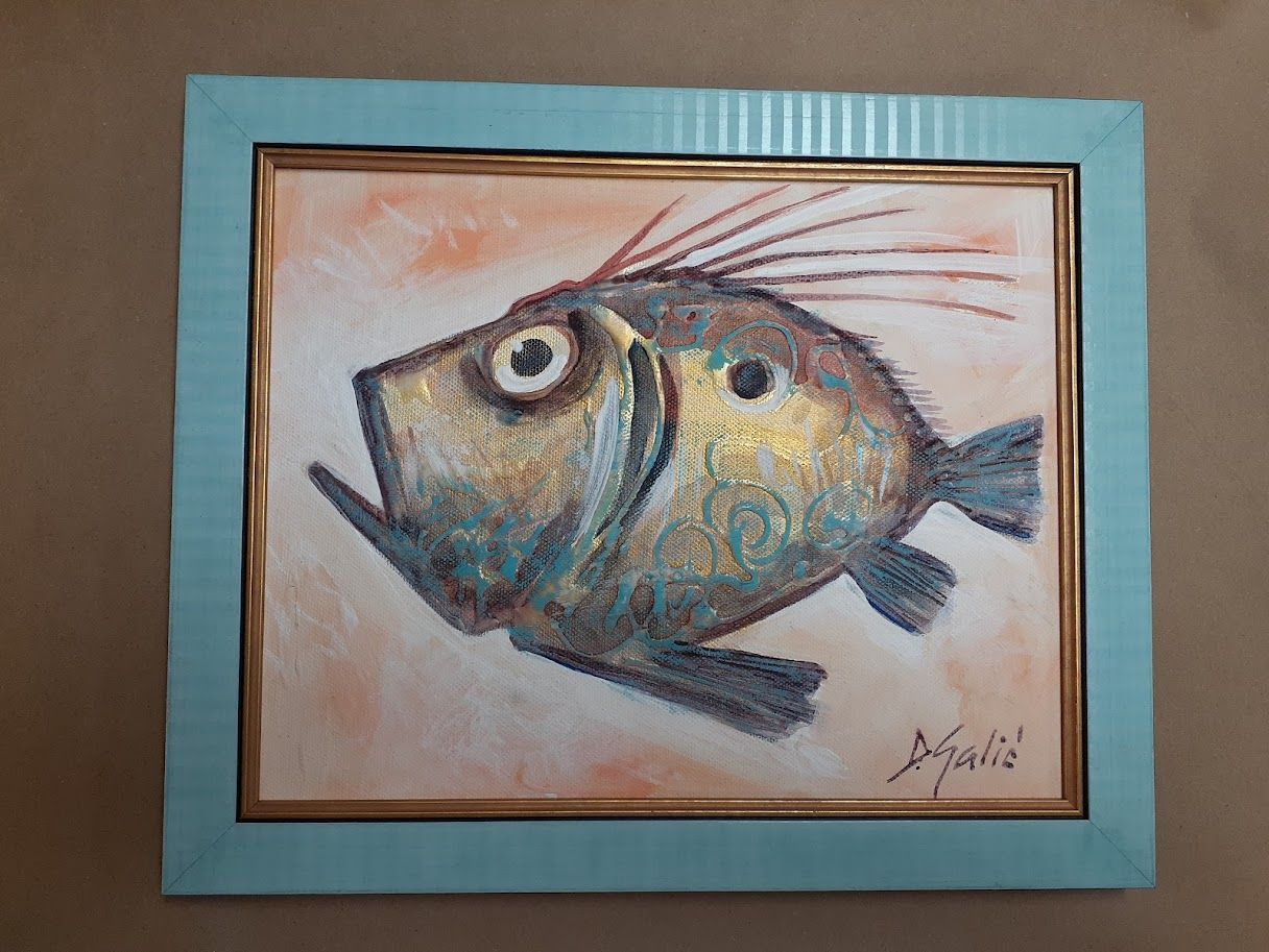 Abstract painting of a fish in blue, gold, and brown, framed in light blue with a gold inner border.