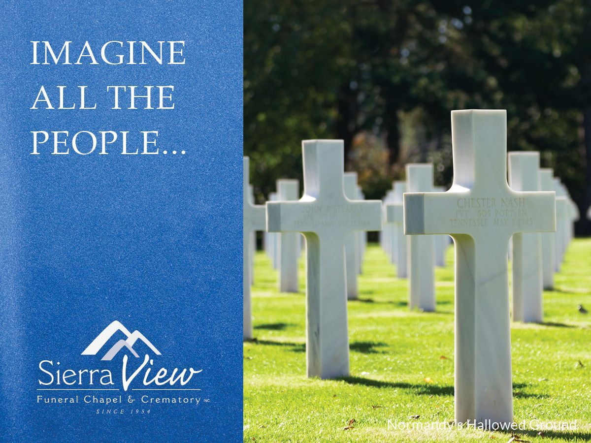 A photo of a cemetery with cross markers