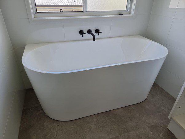 A tub installed with home renovation plumbing on the Sunshine Coast