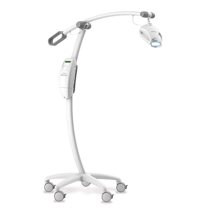 A white teeth whitening machine with wheels on a stand on a white background.