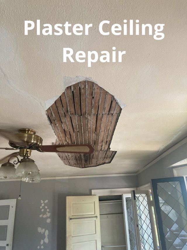 a ceiling fan is hanging from the ceiling in a room .