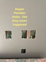 a sign that says `` repair plumber holes - like they never happened '' .