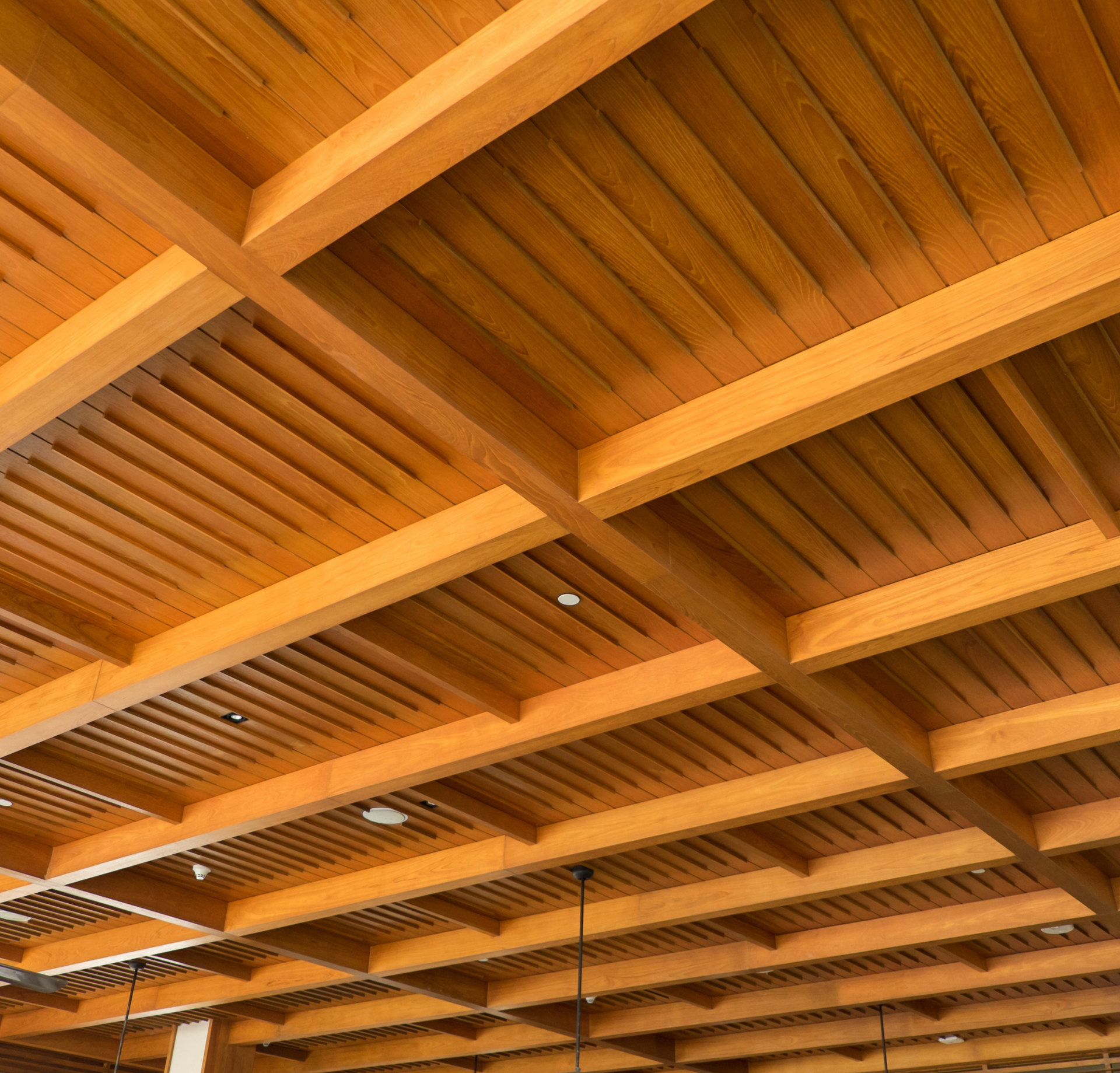 A close up of a wooden ceiling in a building