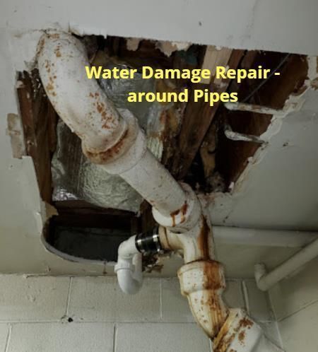 a picture of water damage repair around pipes .
