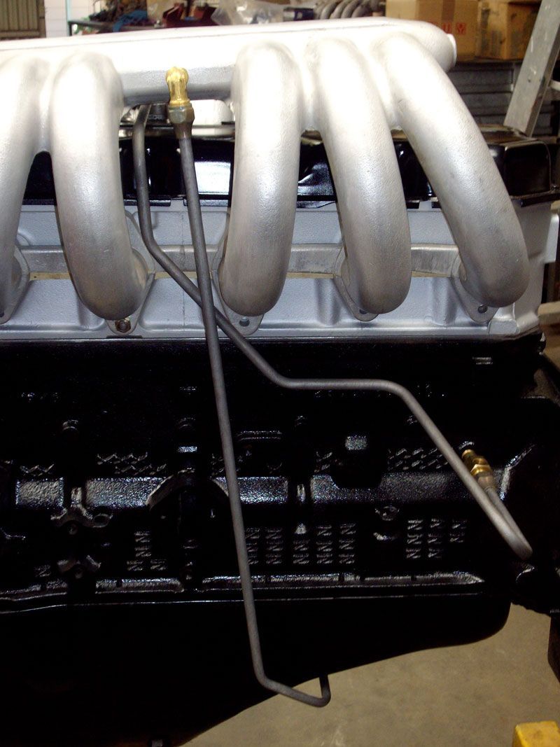 A close up of the intake manifold of a car engine