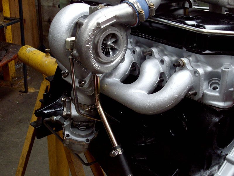 A close up of a turbo on a car engine