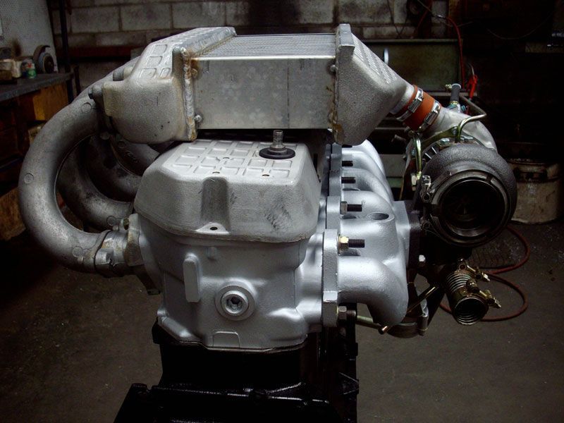 A large engine with a turbocharger attached to it