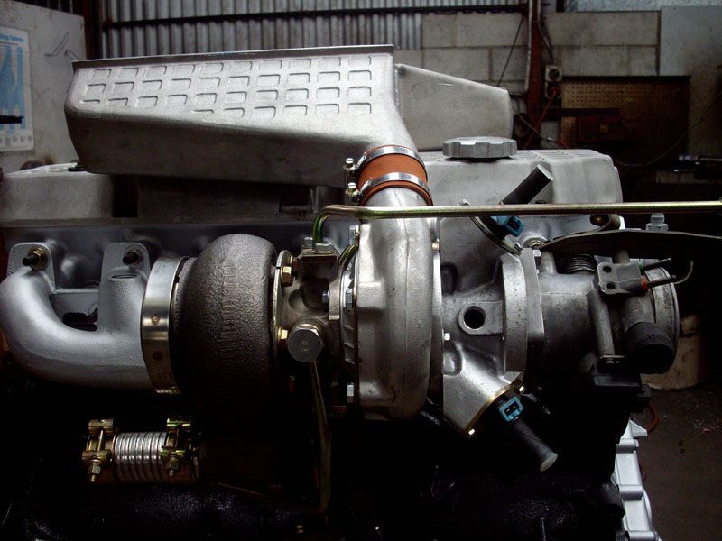 A close up of a turbo on a car engine