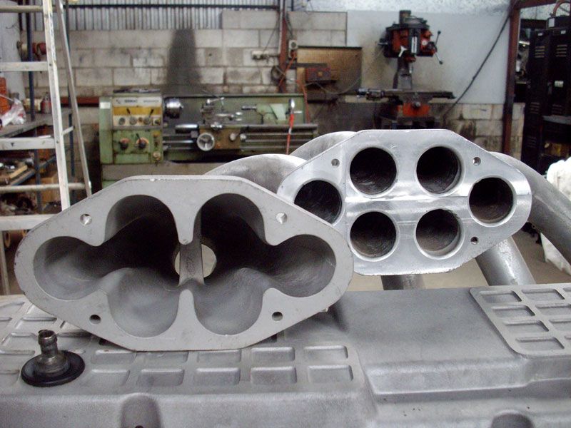 A couple of pieces of metal with holes in them