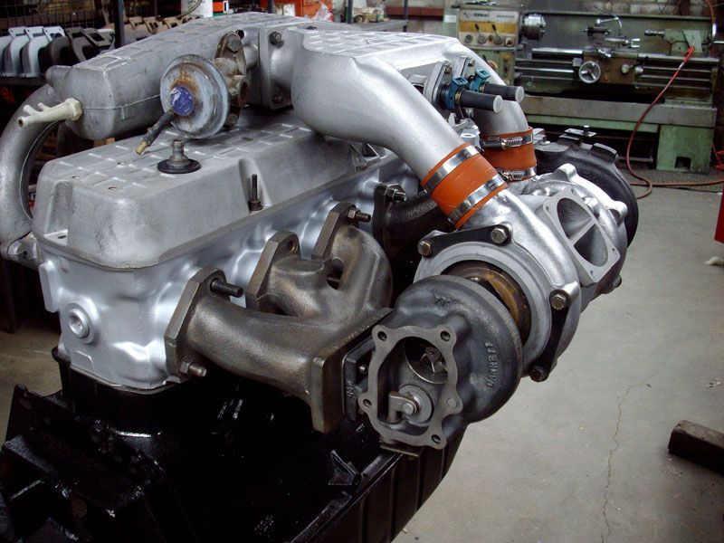 A car engine with a turbocharger attached to it