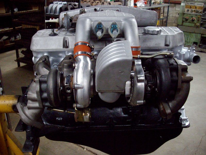 A car engine with a turbocharger attached to it