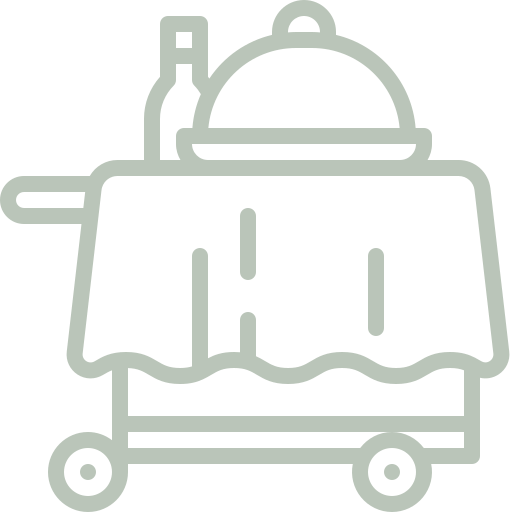 A line drawing of a trolley with a tray and a bottle on it.