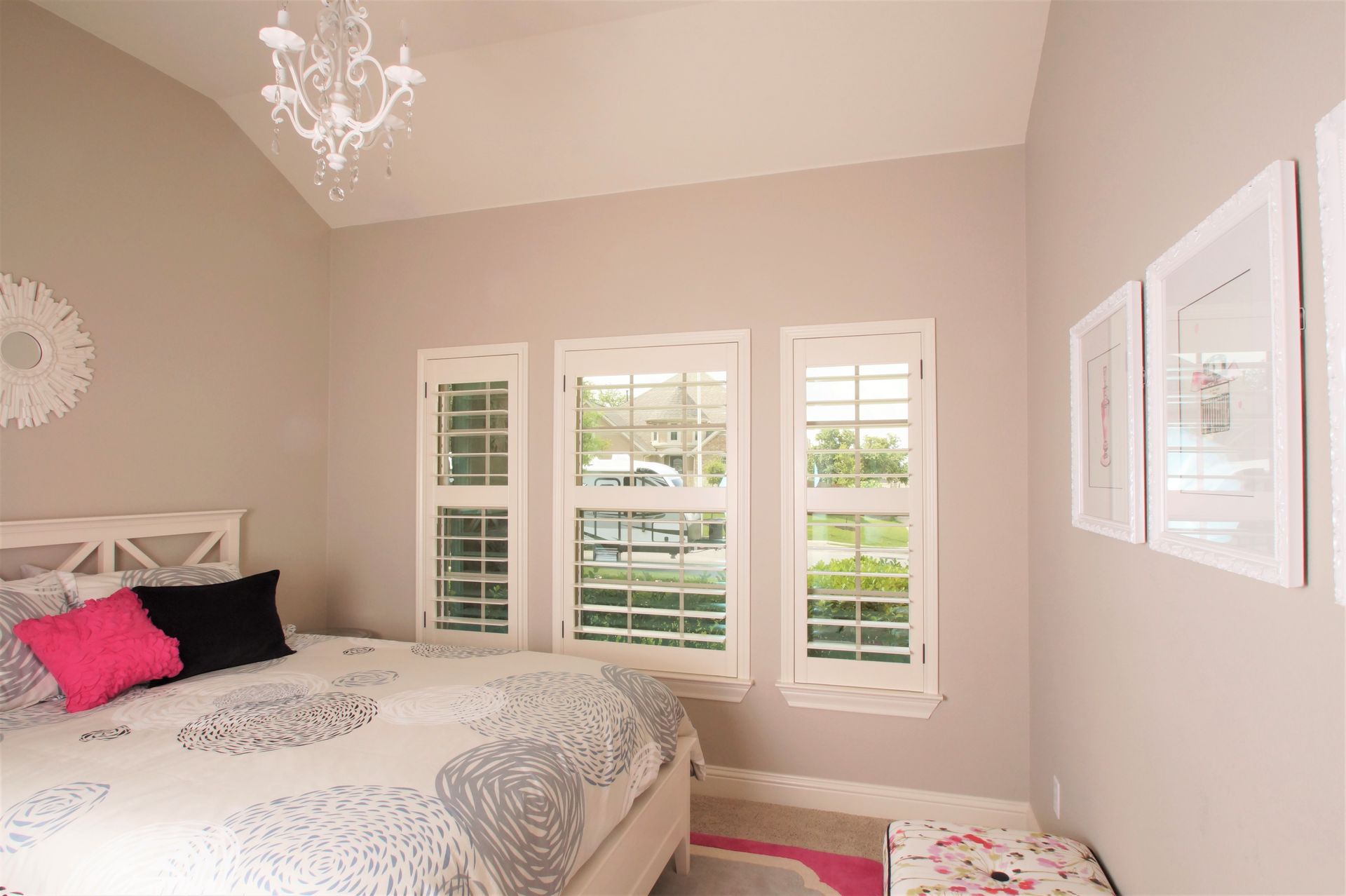 Luxurious white plantation shutters in a serene Bastrop bedroom