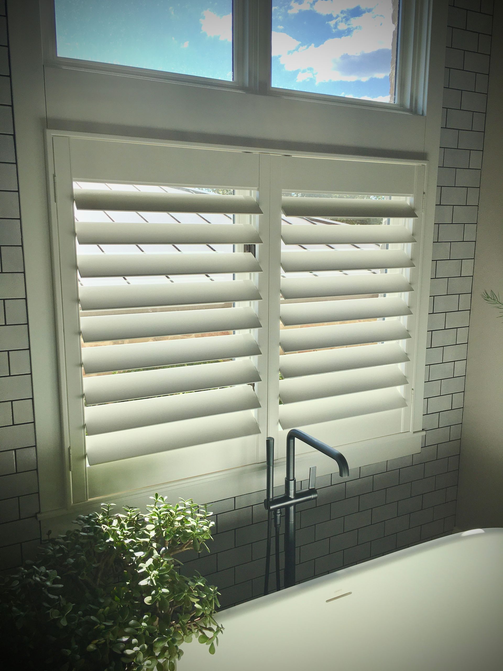 Cafe Style Shutters in a West Lake Hills Bathroom