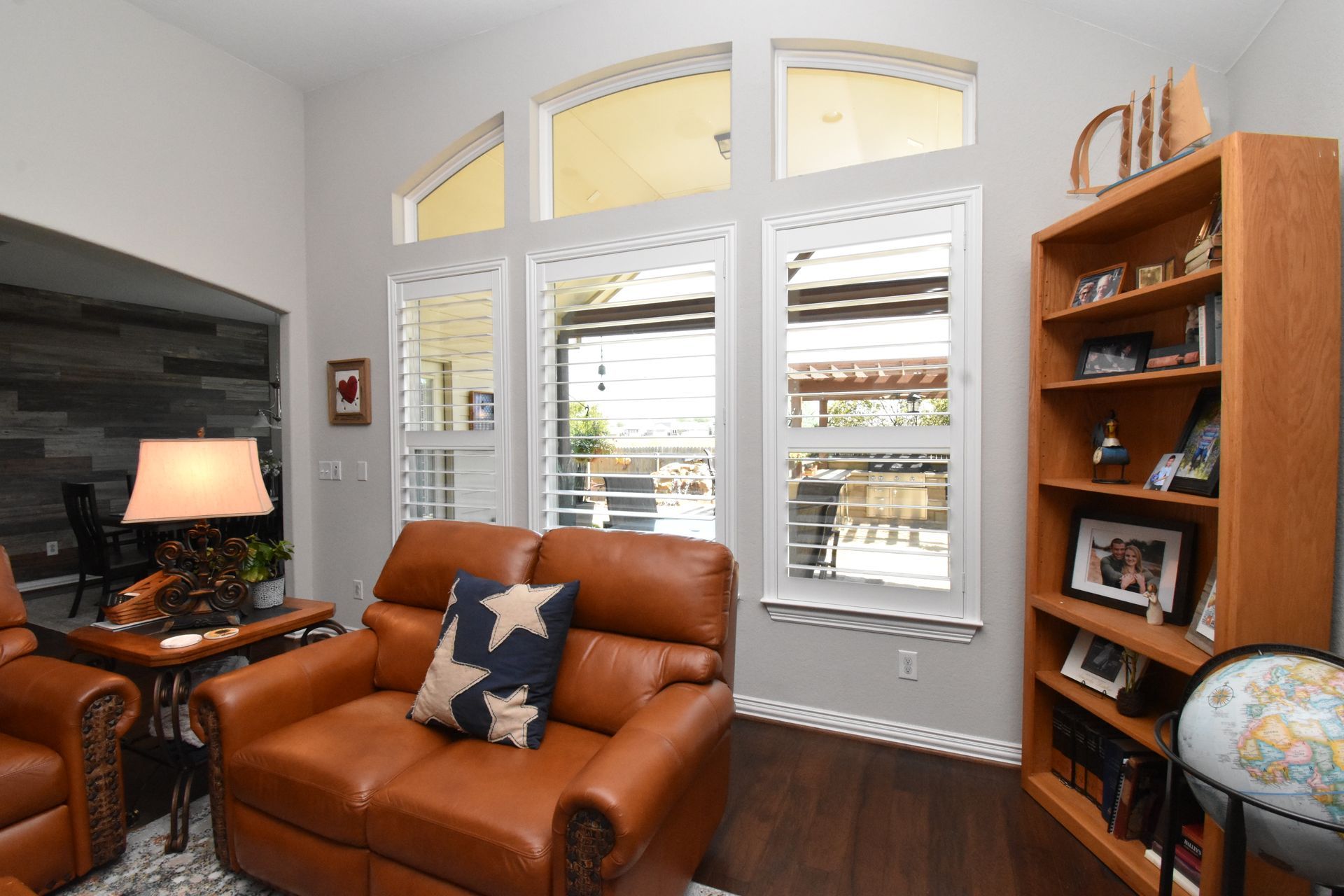 classic white plantation shutters in texas style living room