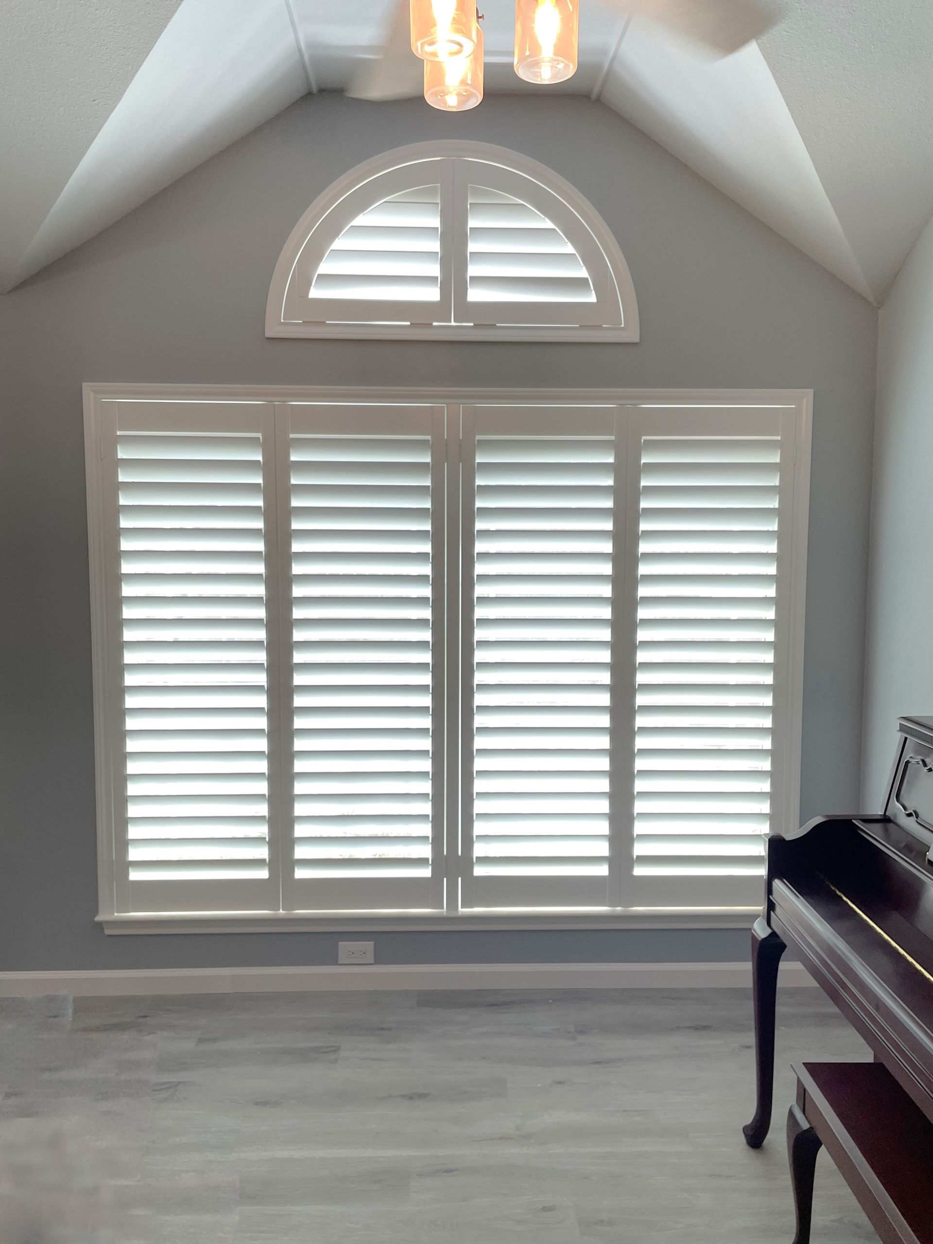 Half moon plantation shutters