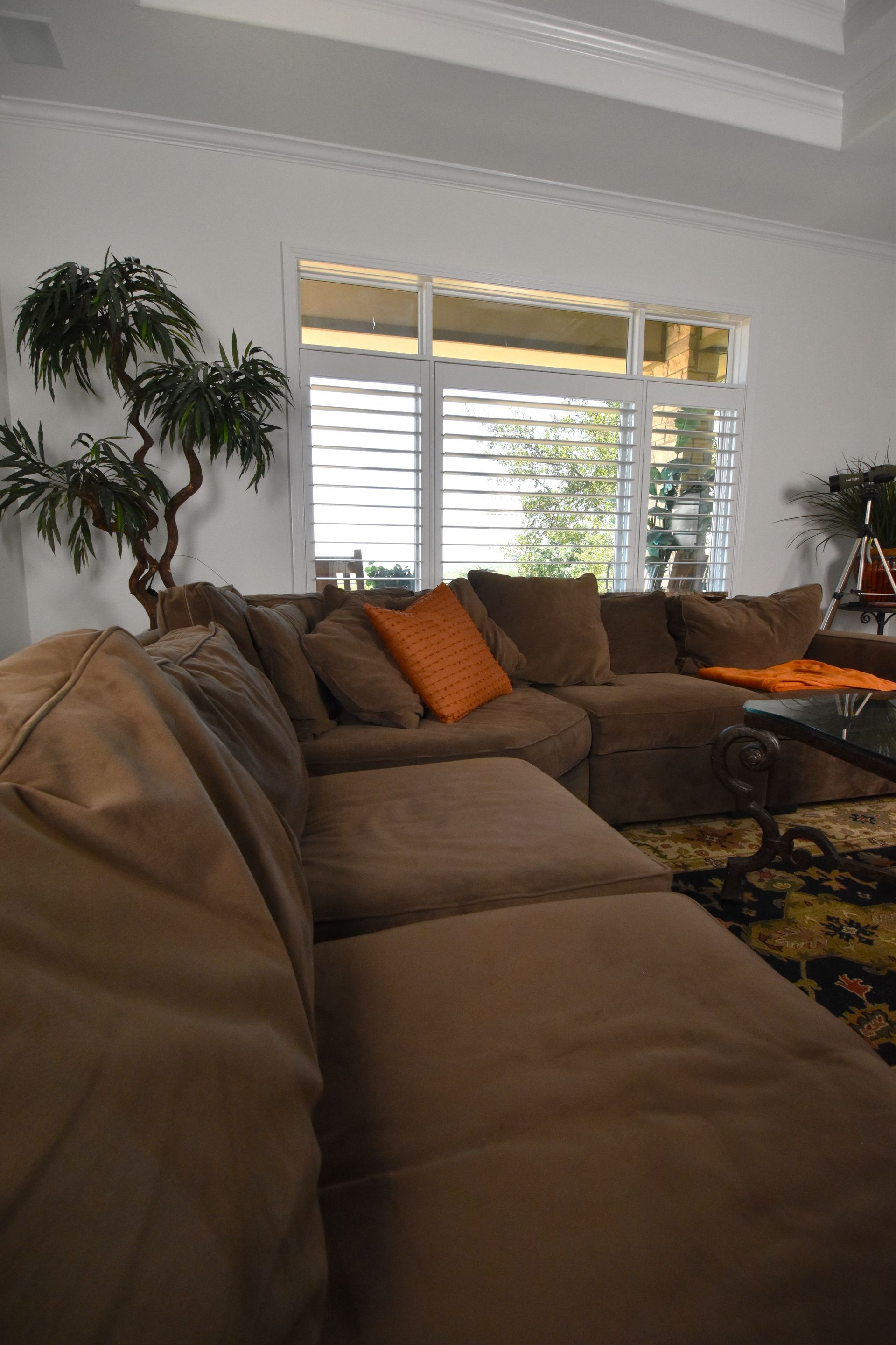 large window shutters in living room of Austin home