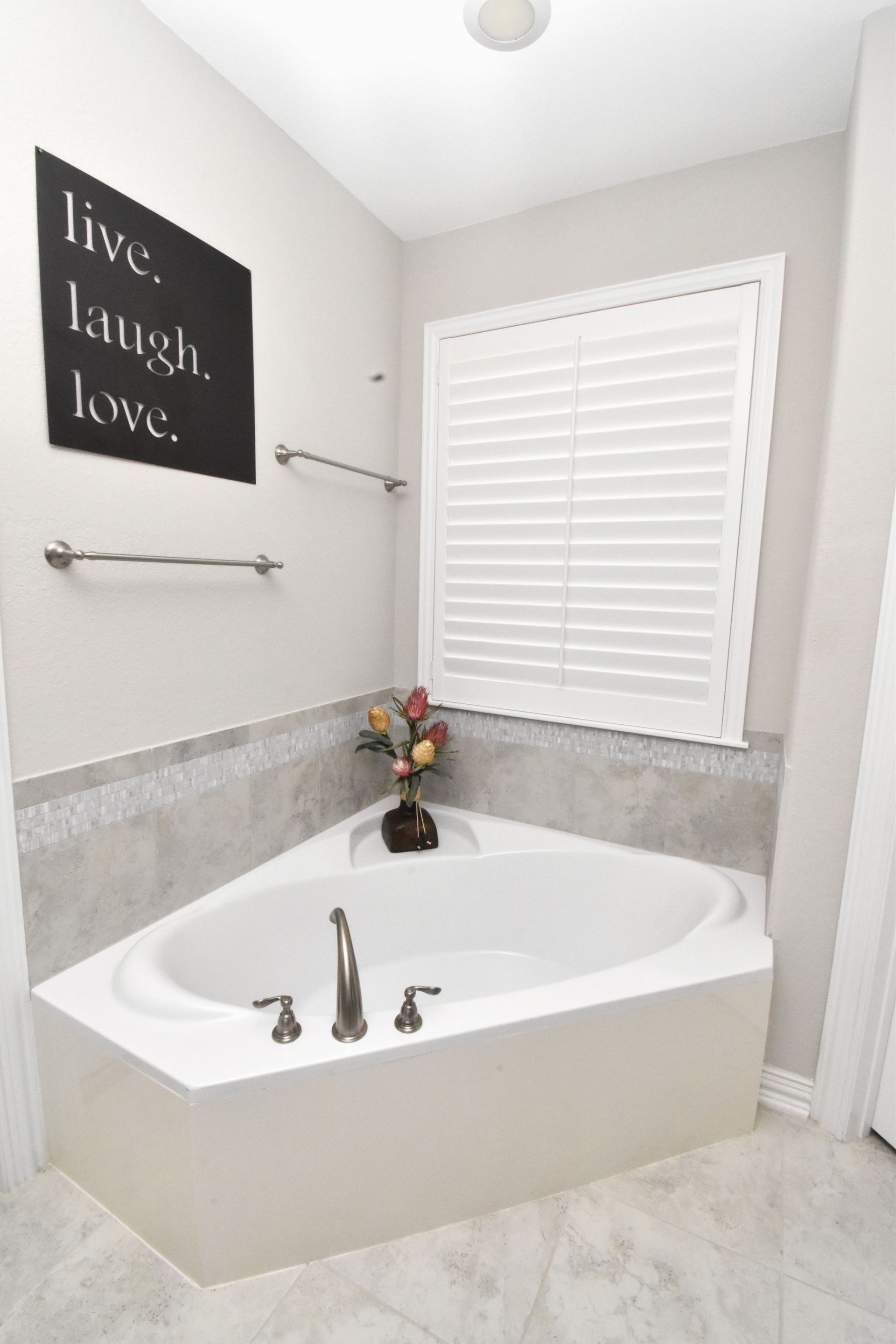 white plantation blinds in Austin bathroom