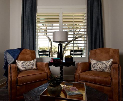 Traditional cream plantation shutters in Westlake Hills, Austin home 
