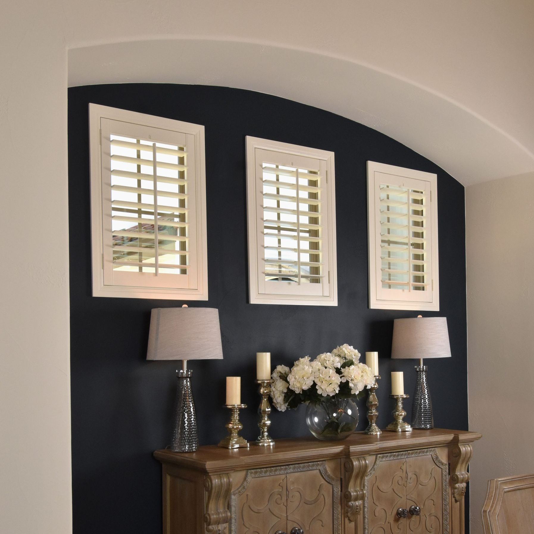 small off white plantation shutters in elegant dining room 